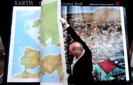 Географический атлас самая тяжелая книга